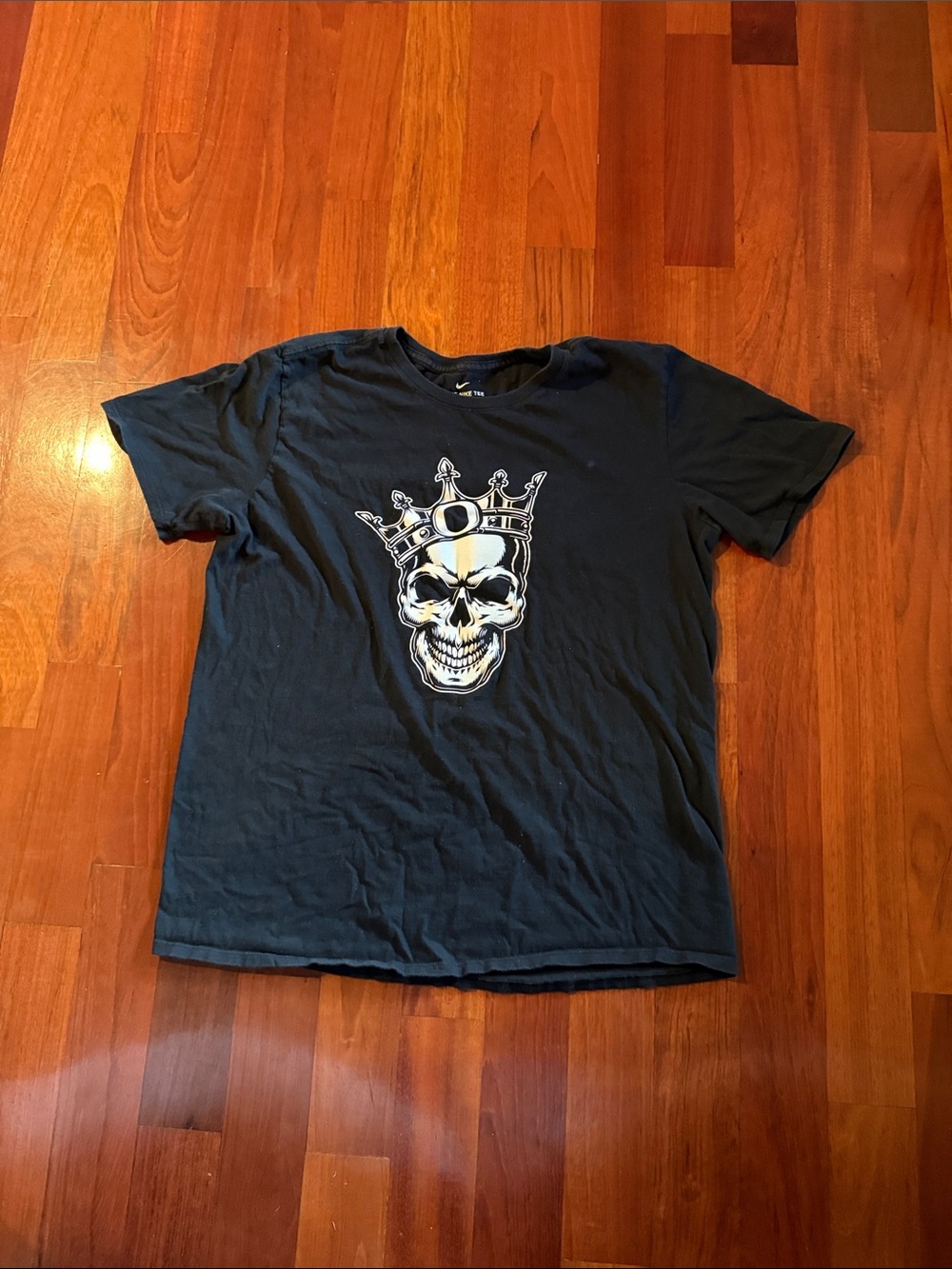 Nike Black Short-Sleeve Tee with Crowned Oregon Ducks Skull Graphic